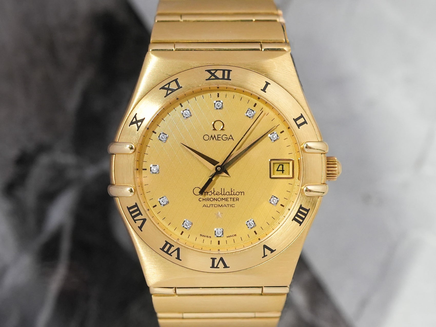 Omega Constellation Manhattan Dial with 11 Point Diamond in 18k Yellow Gold 1102.15.00